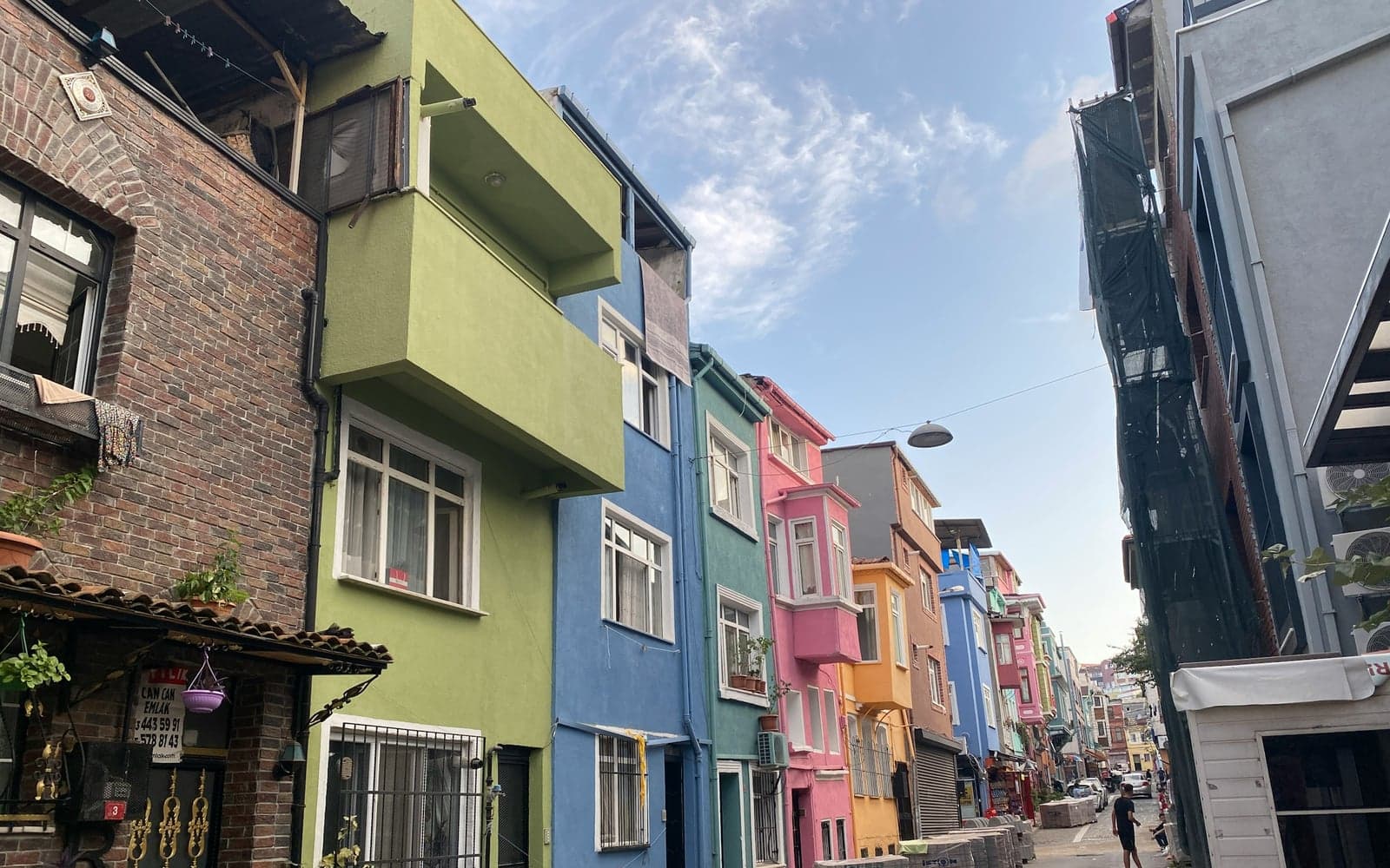 Colorful Balat houses on a sloped Istanbul street