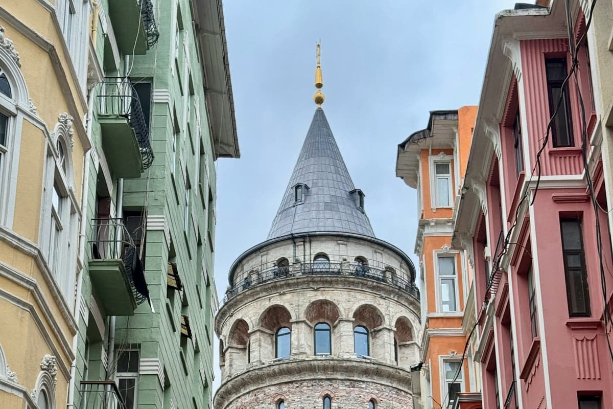 Galata Tower surrounded by colorful old buildings
