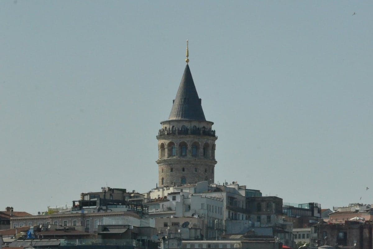 Galata Tower and the Istanbul harbor with ferries below