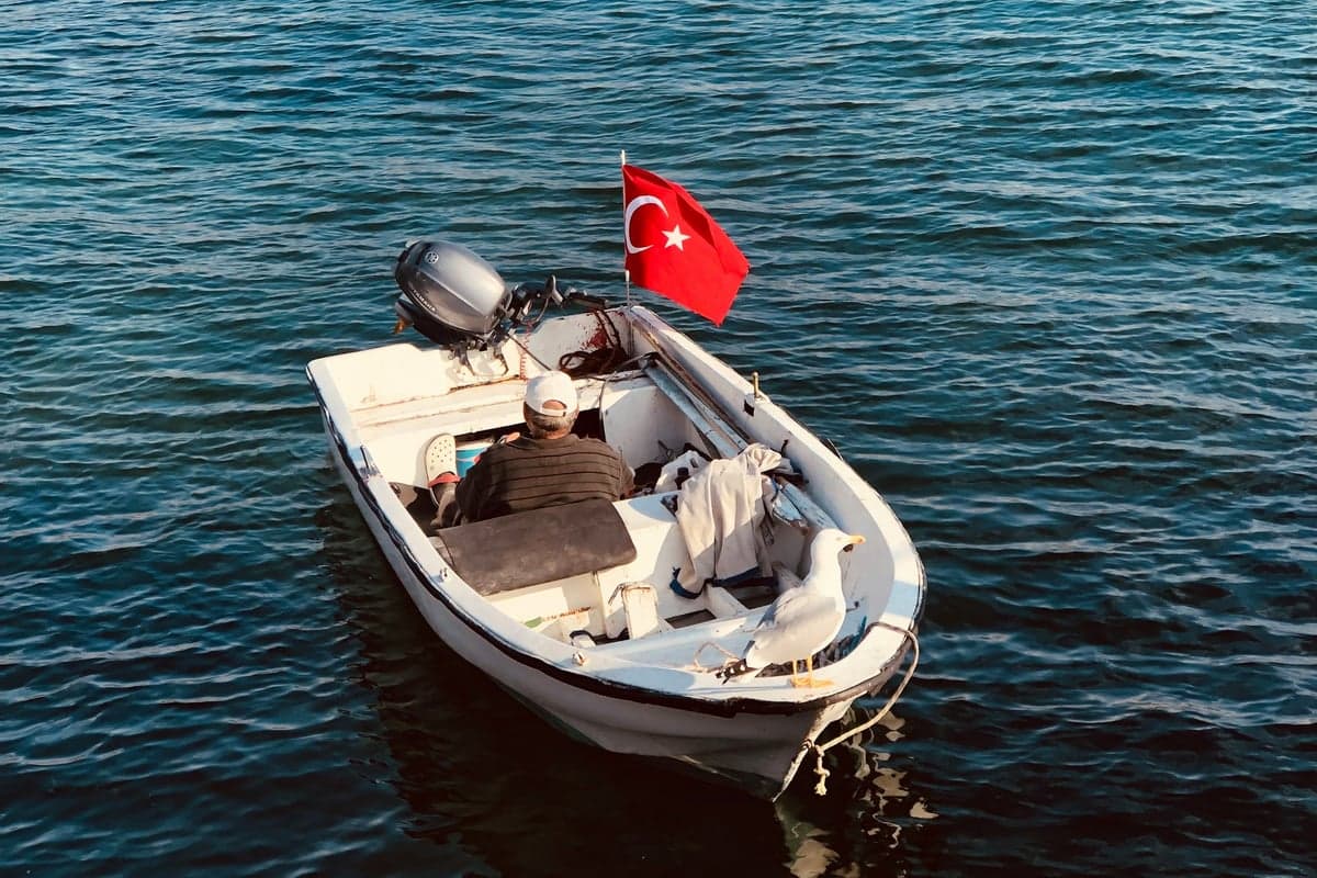 A small boat on the water off Kadikoy